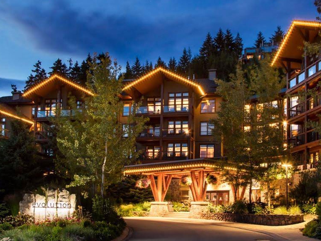 Evolution lodge at Whistler Creekside, lit at dusk